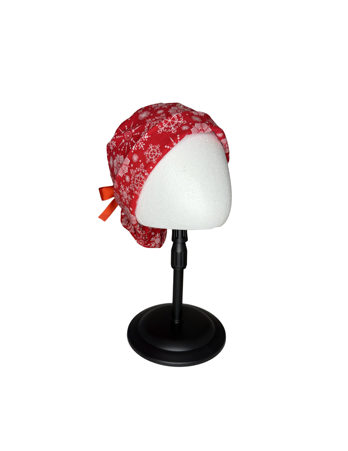 Holiday Snowflakes With Red Background Handmade Pony Tail Style Cap With Ribbon Tie