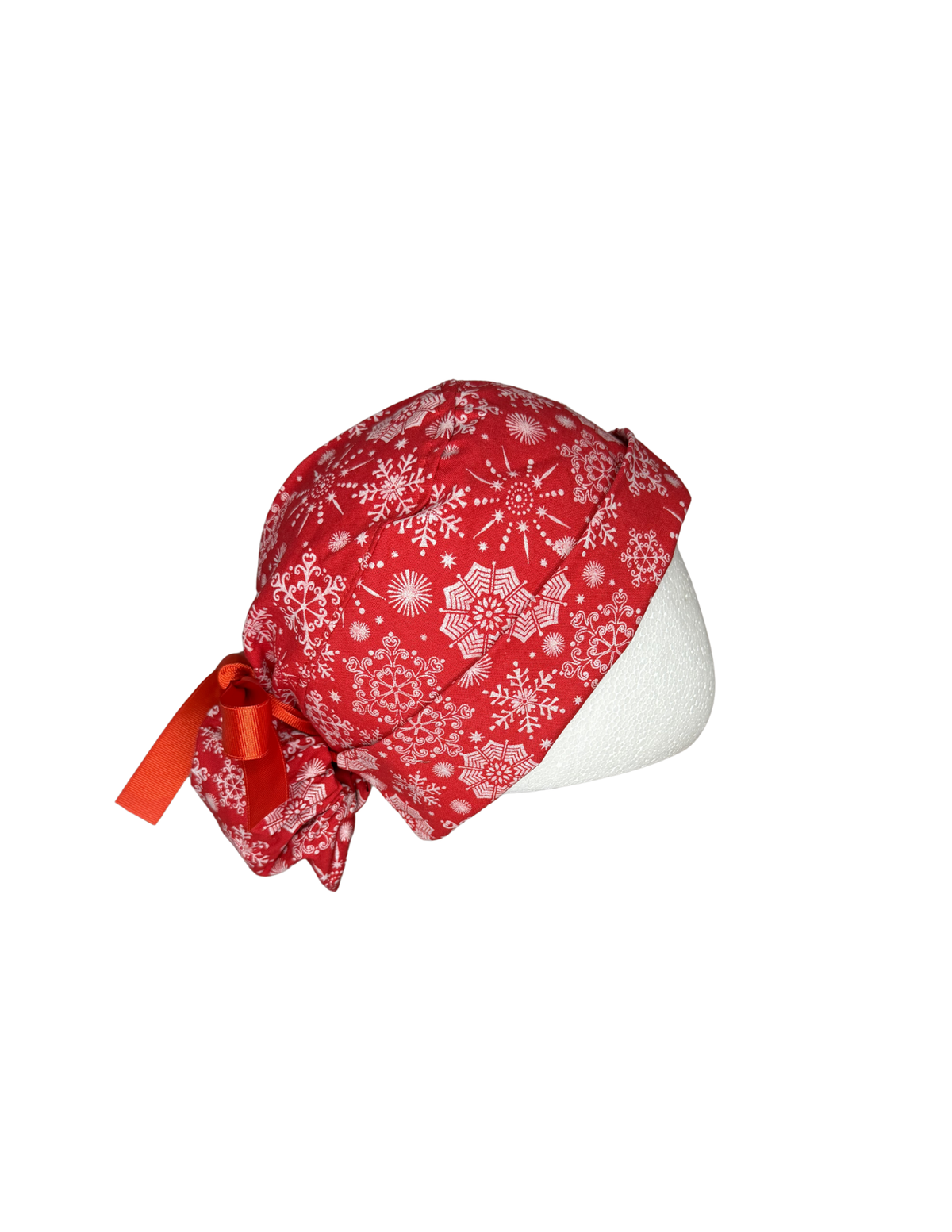 Holiday Snowflakes With Red Background Handmade Pony Tail Style Cap With Ribbon Tie